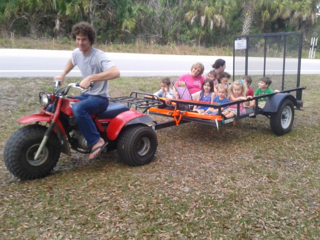 rides around the yard with all the cousins